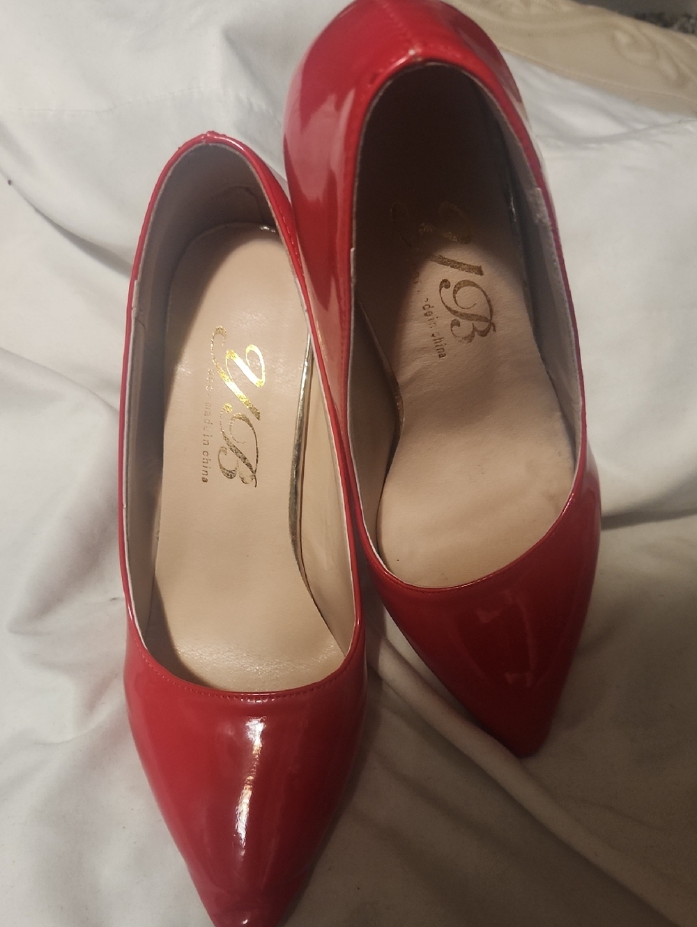 Glossy Red Pointed-Toe Pumps